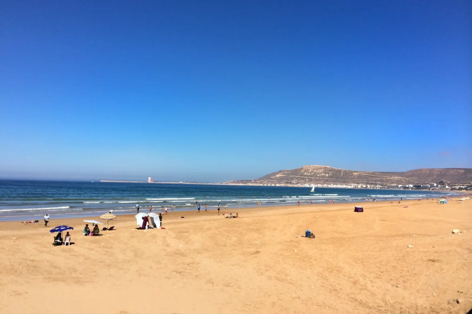 Agadir beach with the Kasbah hill in the background