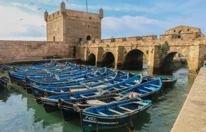 Essaouira sea fortress and blue fishing boats Essaouira sea fortress and blue fishing boats