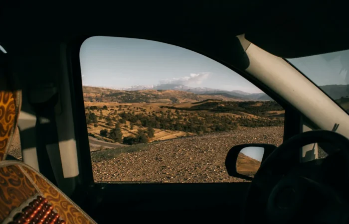 Mountain landscape seen from a car window