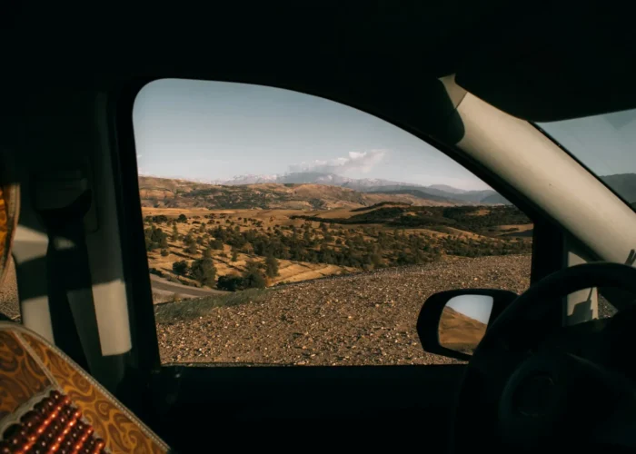 Mountain landscape seen from a car window