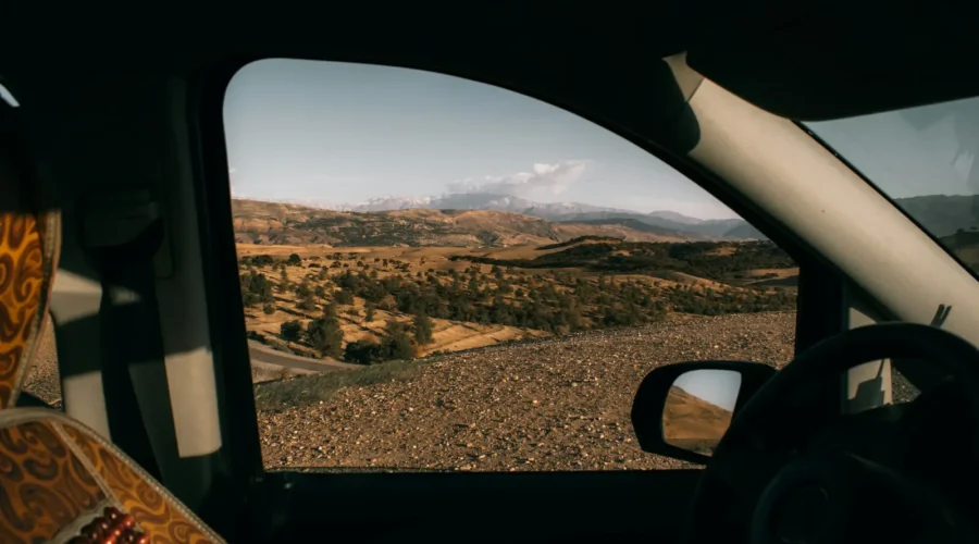 Mountain landscape seen from a car window