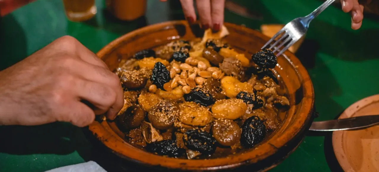 Tagine cooking in a clay pot