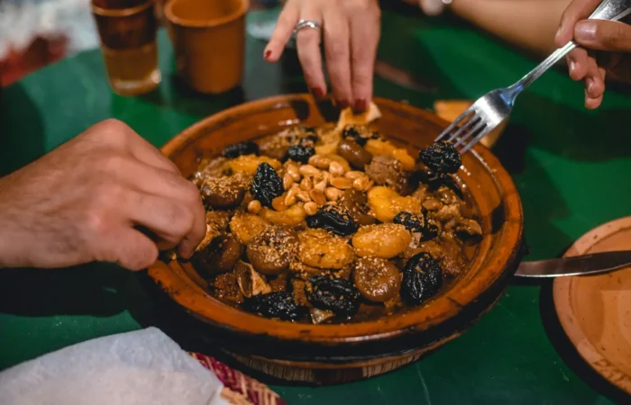 Tagine cooking in a clay pot