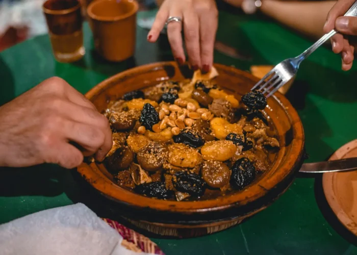Tagine cooking in a clay pot